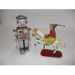 Japanese Tin Plate Clockwork Robot and a Tin Plate Clockwork Rodeo Rider