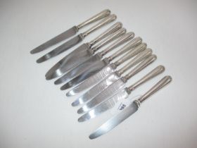 Set of 11 Silver Handle Knives