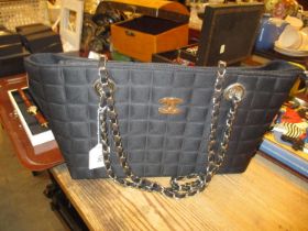 Handbag Bearing Chanel Logo