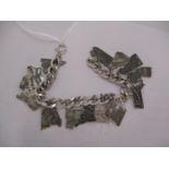 American Vintage Silver Charm Bracelet, each Charm Formed as the Border Outline of Various Named
