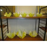 Eight Yellow Handkerchief Glass Dishes