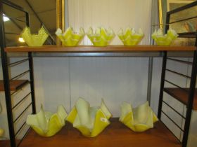 Eight Yellow Handkerchief Glass Dishes