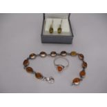 Silver and Amber Bracelet, Ring and a Pair of Earrings