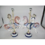 Pair of Lladro Figures of a Boy and Girl on Carousel Horses Nos. 1469, 1470