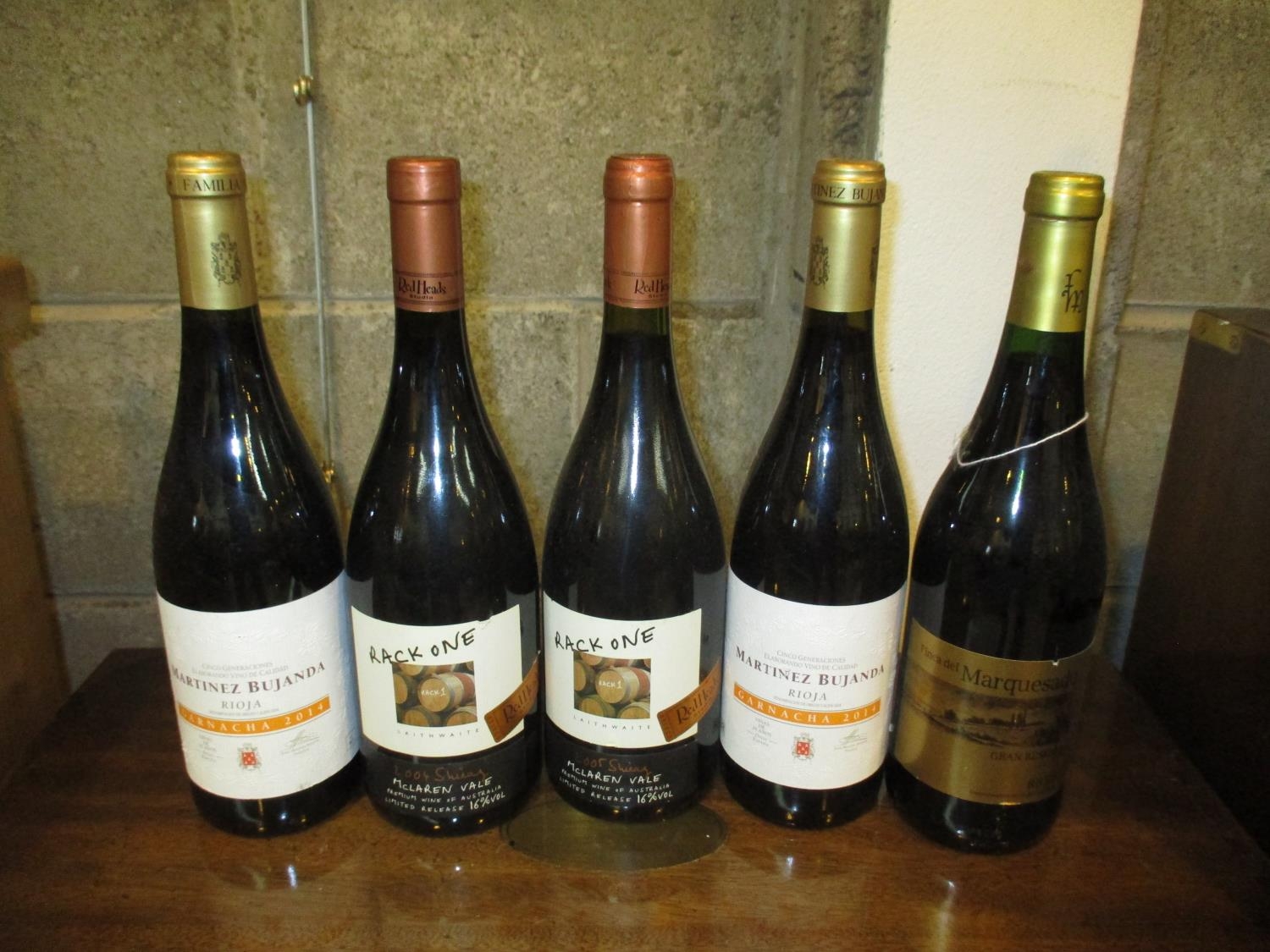 Two Bottles Martinez Bujanda Rioja 2014, Finca del Marquesado Grand Reserva Rioja 2008, and Two