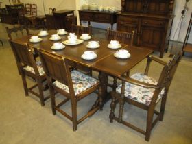 Ercol Oak Draw Leaf Dining Table with 6 Cahirs