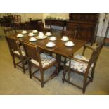 Ercol Oak Draw Leaf Dining Table with 6 Cahirs