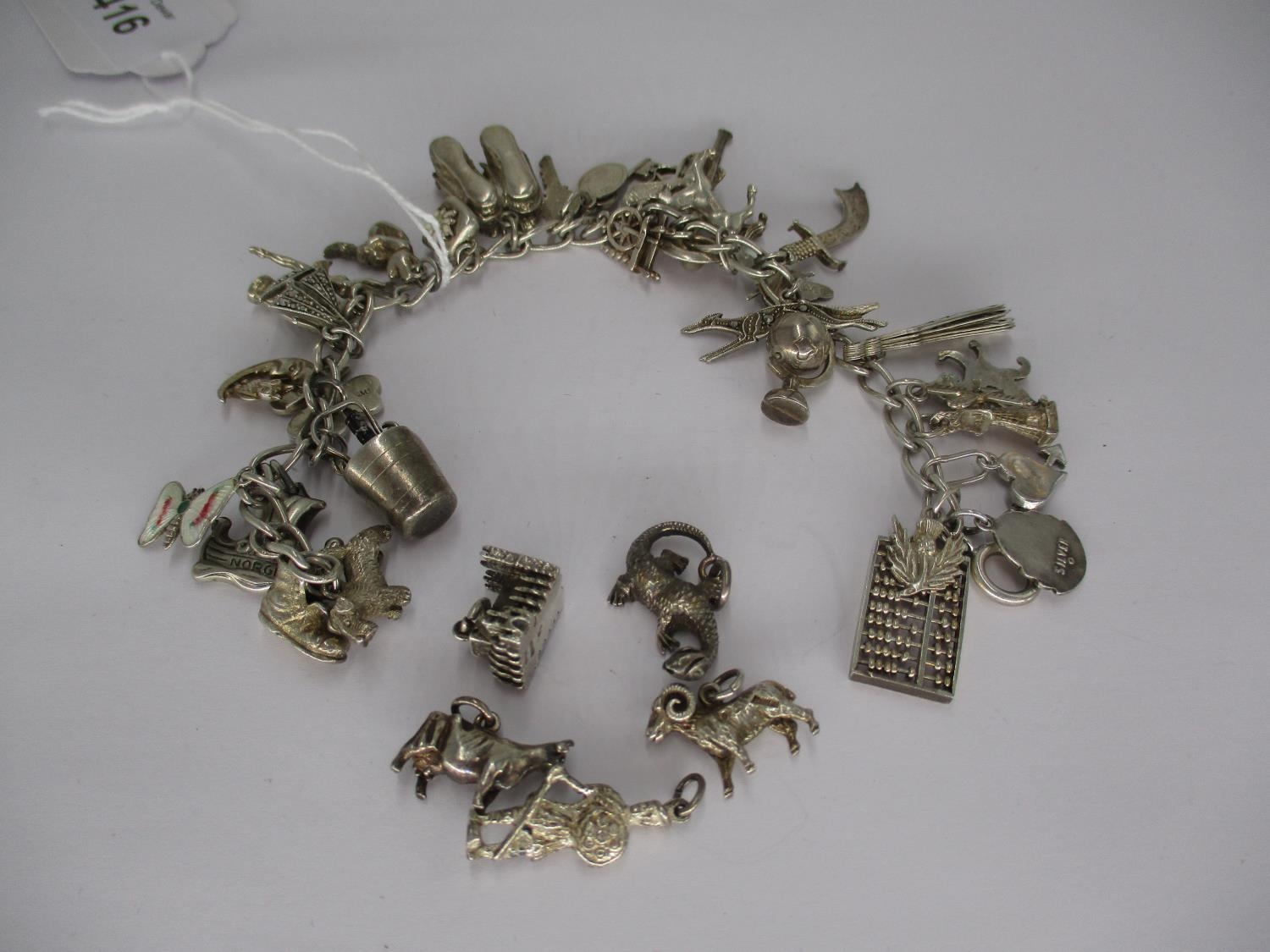 Silver Charm Bracelet, 68.97g
