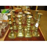 Four Pairs of Victorian Brass Candlesticks