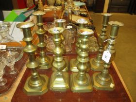 Four Pairs of Victorian Brass Candlesticks