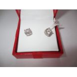 Pair of 14K White Gold and Diamond Earrings, total diamond weight 1.250 cts