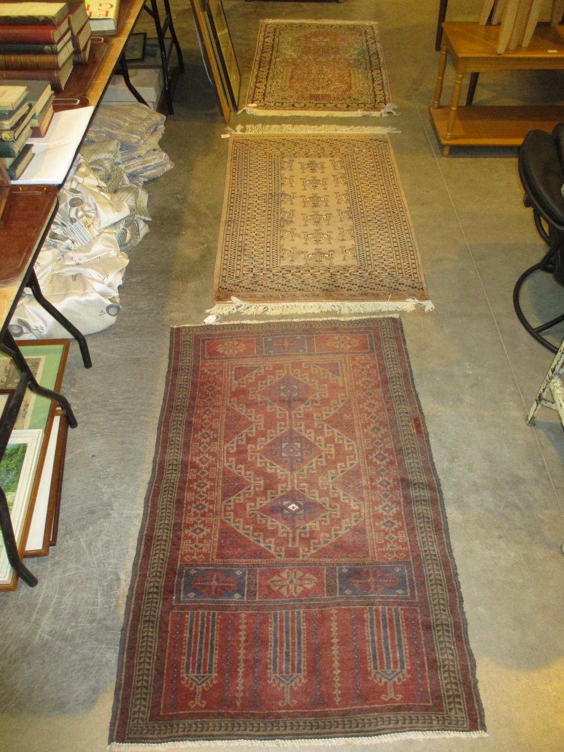 Three Eastern Rugs, 134x84cm, 129x82cm and 130x80cm