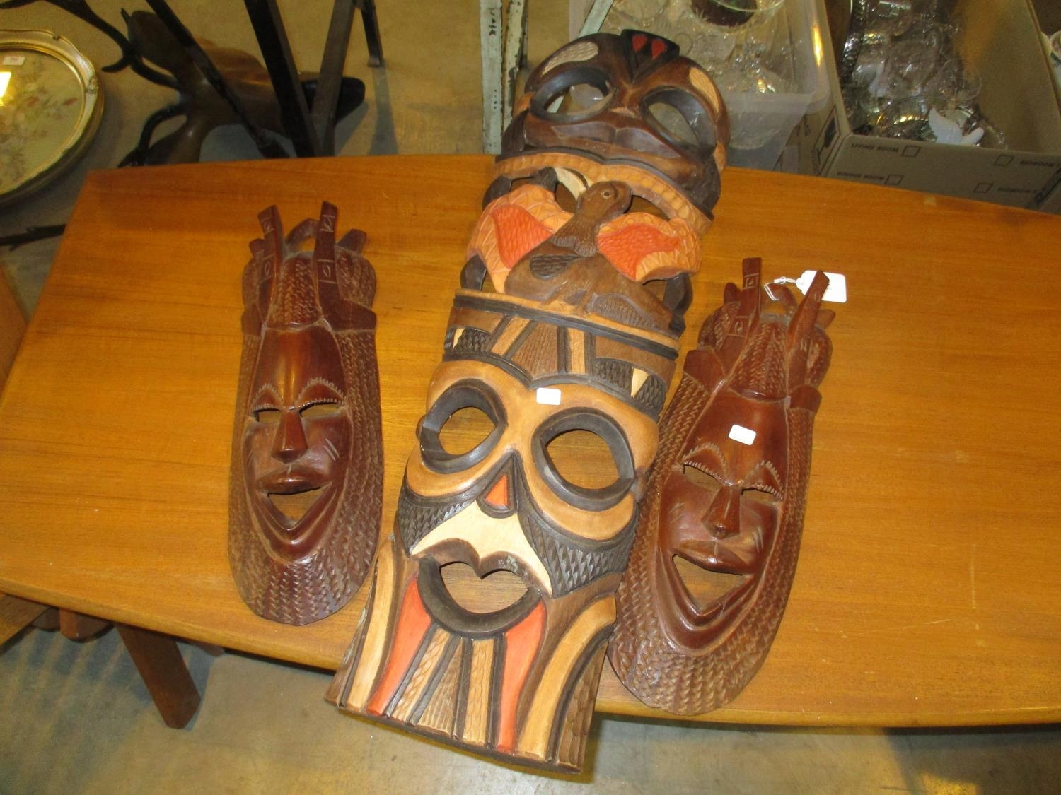 Three African Carved Wood Mask Plaques