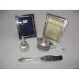 Two Small Silver Photograph Frames, Silver Mustard Pot, Silver Funnel and a Silver Handle Knife