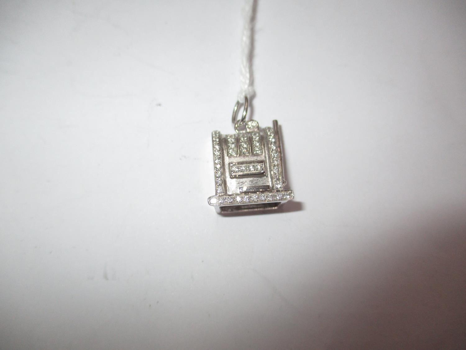 One 18K White Gold Diamond Slot Machine Pendant/Charm (without Chain) containing Melee Round