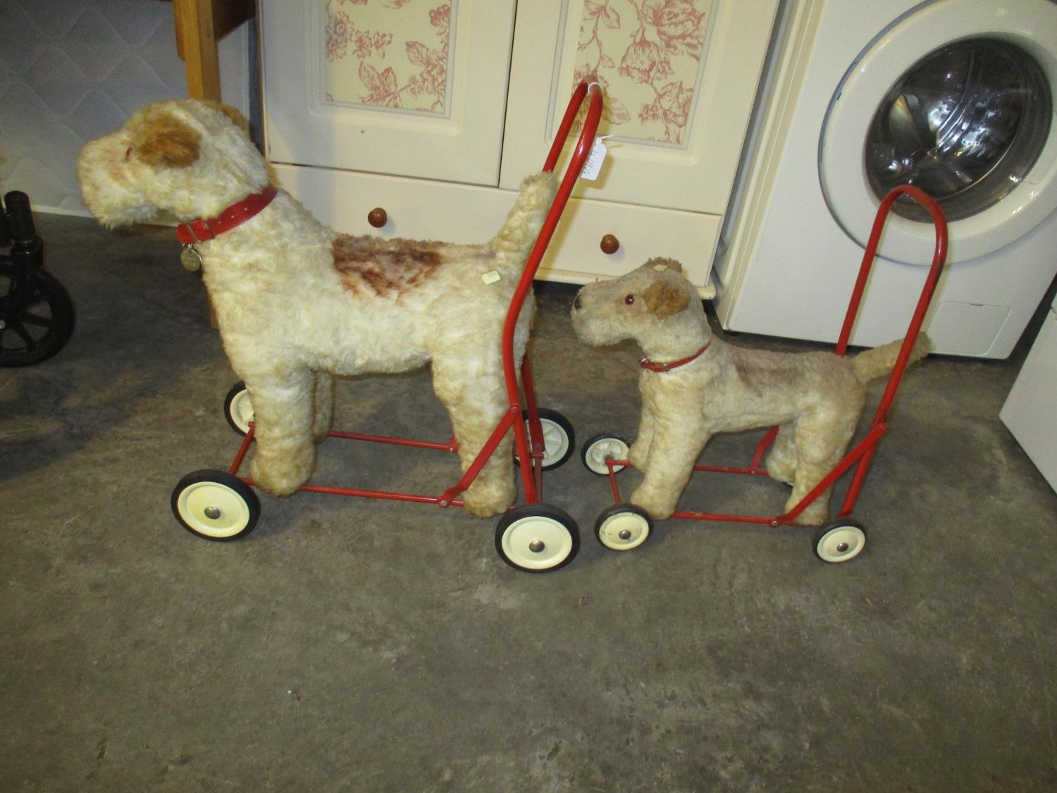 Two Vintage Push Along Dogs