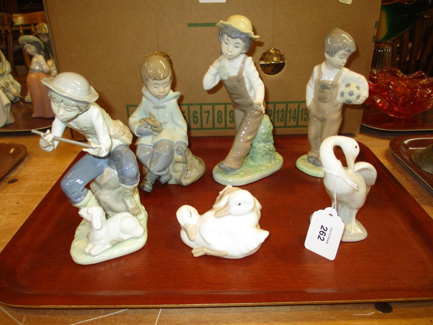 Four Nao Figures and Ducklings and a Lladro Goose