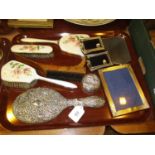 Two Silver Back Hand Mirrors, Silver Top Trinket Box and 3 Silver Figures along with 3 Brushes and a