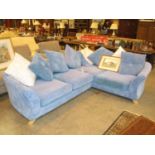 Pale Blue Corner Suite having a Loose Cushion Back