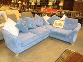 Pale Blue Corner Suite having a Loose Cushion Back