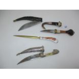 Two Middle Eastern Sheathed Daggers and a Folding Knife, along with a Letter Knife