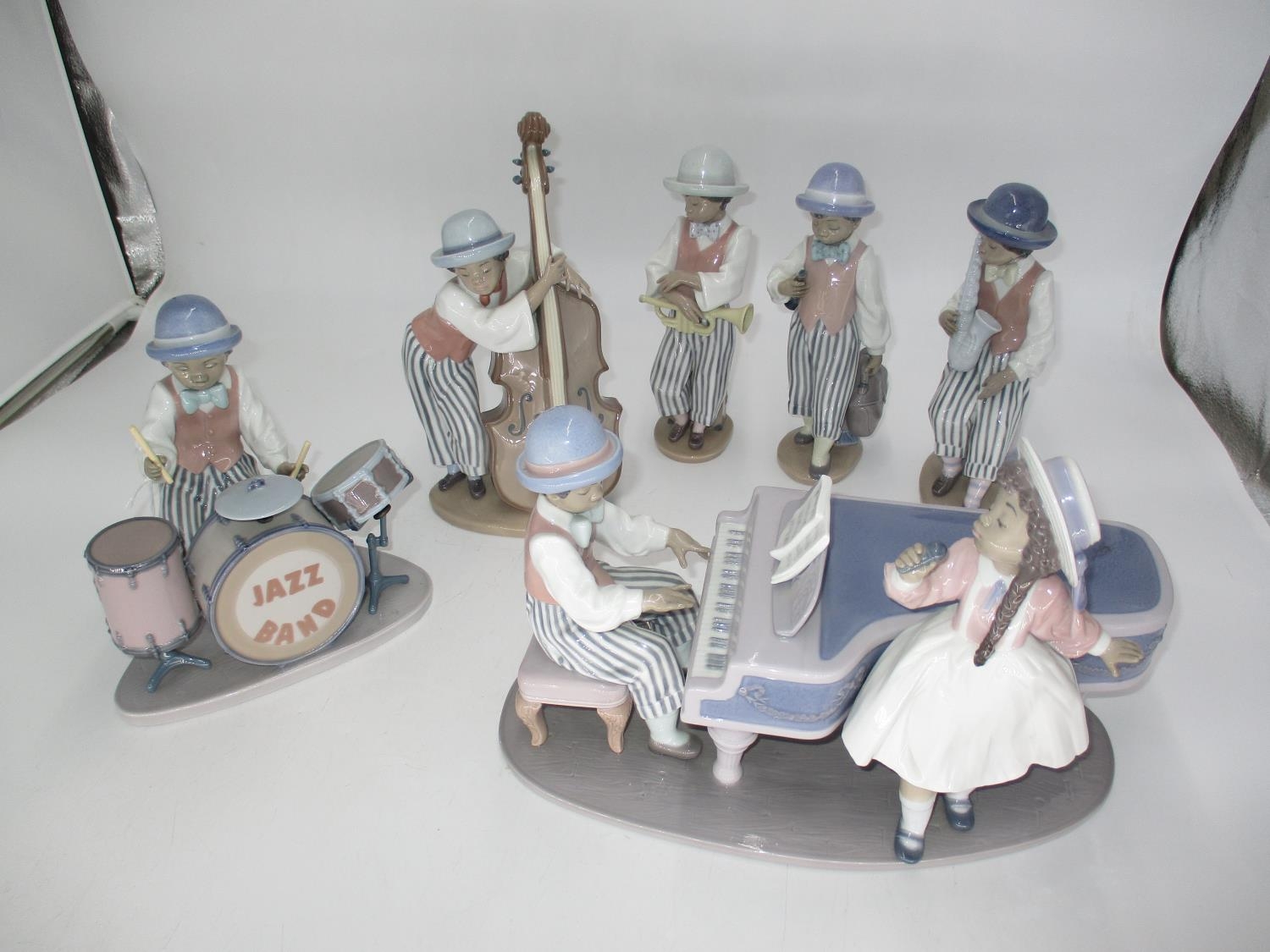 Lladro 6 Piece Jazz Band comprising Pianist and Singer, Drum Kit, Saxophone, Double Bass, Trumpet,