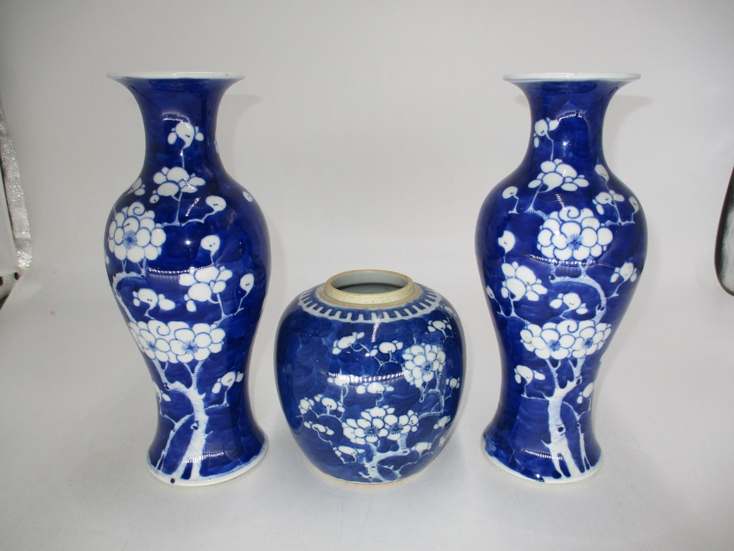 Pair of Chinese Porcelain Blue and White Prunus Vases and Ginger Jar, 25 and 13cm