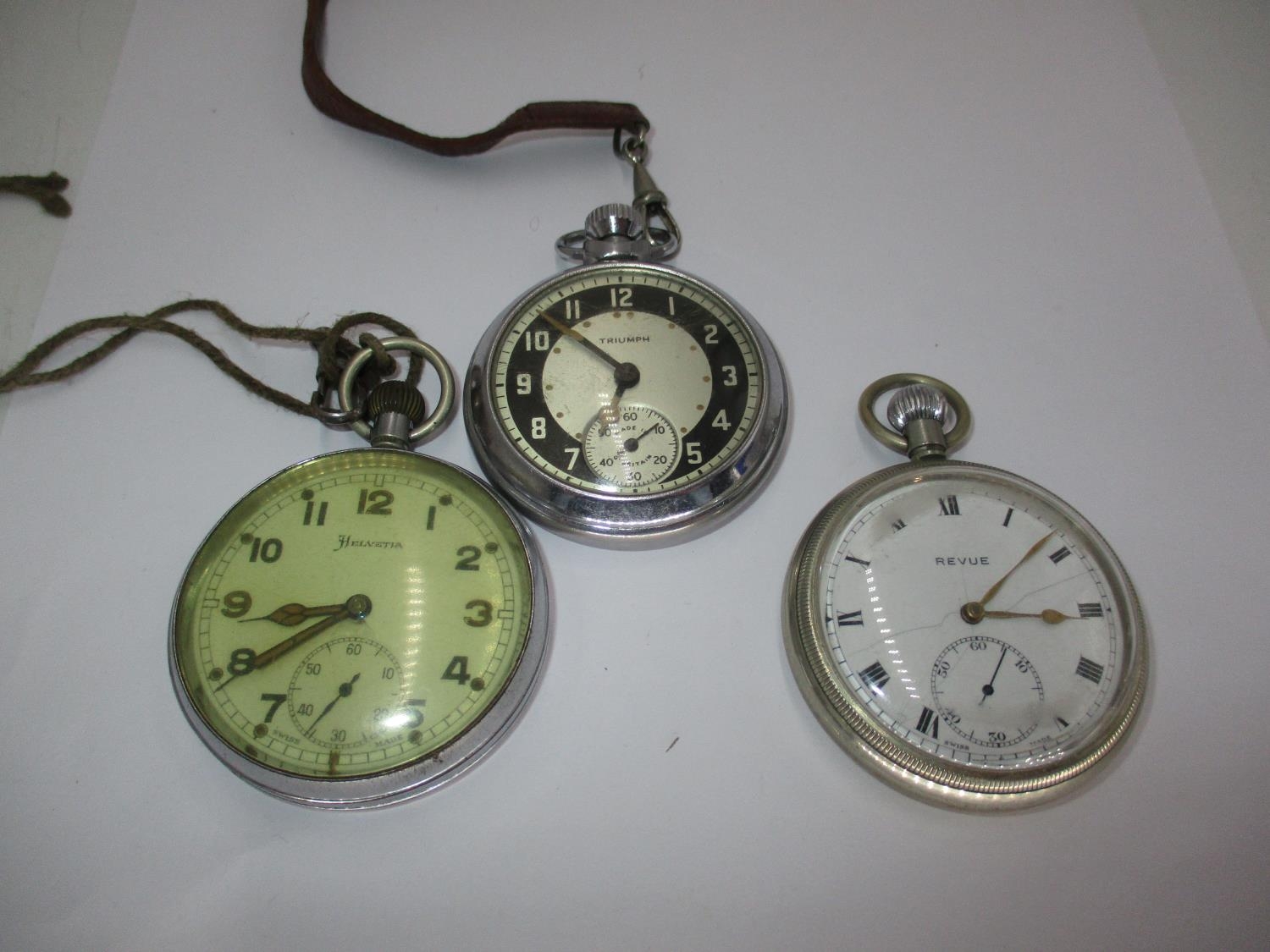 Two Military Issue Pocket Watches Revue 2983 and Helvetia GS/TP P71710, along with a Triumph