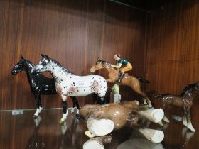 FIVE ASSORTED BESWICK HORSES TO INCLUDE AN APPALOOSA & CH BLACK MAGIC ETC ALL HAVE DAMAGE OR
