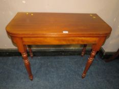 A MAHOGANY FLIP TOP TABLE