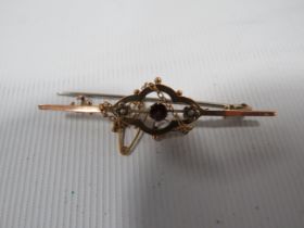 VICTORIAN 9CT GOLD BAR BROOCH SET WITH GARNET AND SEED PEARLS