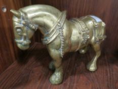 A HEAVY CAST BRASS MODEL OF A SHIRE HORSE