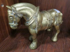A HEAVY CAST BRASS MODEL OF A SHIRE HORSE