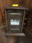 A VINTAGE WOODEN PERPETUAL DESK CALENDAR