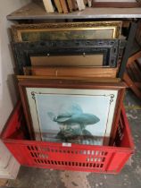 A RED CRATE OF ASSORTED PICTURES TO INCLUDE A MIRROR