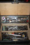 A LOCKING WOODEN CARPENTERS TOOL BOX AND CONTENTS SPANNER ETC