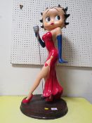 A LARGE BETTY BOOP FIGURE ON WOODEN PLINTH APPROX 75CM