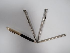 TWO VINTAGE SILVER PROPELLING PENCILS AND TWO OTHERS