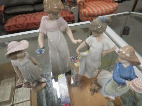 FOUR NAO FIGURINES