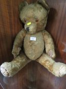 A VINTAGE WORN MOHAIR JOINTED TEDDY BEAR APPROX HEIGHT 62CM