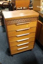 A RETRO TEAK WHITE AND NEWTON SEVEN DRAWER CHEST - W 61 CM