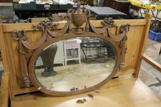 AN EARLY 20TH CENTURY OAK WALL MIRROR A/F