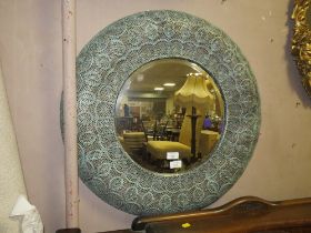 AN EASTERN STYLE MODERN METAL MIRROR WITH TWO GLOBE SHADES