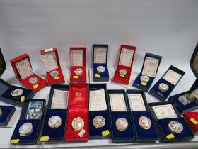 A COLLECTION OF 18 HALCYON DAYS ENAMEL TRINKET BOXES TO INCLUDE LIMITED EDITION DAWN OF THE 21ST
