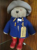A VINTAGE PADDINGTON BEAR WITH TAG AND DUNLOP BOOTS APPROX HEIGHT 50CM