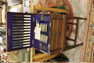 AN EDWARDIAN MAHOGANY CANTEEN OF WALKER & HALL CUTLERY