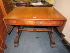 A 19TH CENTURY CROSSBANDED MAHOGANY SOFA TABLE, with two frieze drawers, raised on shaped supports