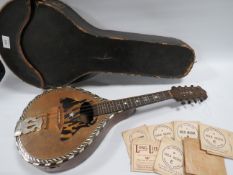 A CASED CONTINENTAL MANDOLIN WITH INLAID DECORATION BY H WEBB WOLVERHAMPTON