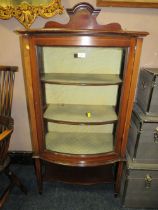 A MAHOGANY BOW FRONTED DISPLAY CABINET