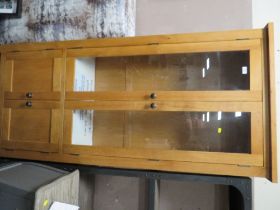 A MODERN LIGHT OAK EFFECT GLAZED BOOKCASE - W 87 CM